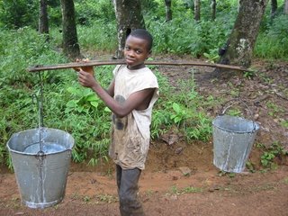 Child worker on Firestone rubber plantation in Liberia